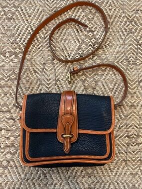 Dooney and Bourke All Weather Leather Black and Brown Trim Crossbody Bag